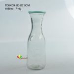 Glass milk bottle with ebossed design 1L