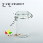 Clear glass jar with clips