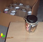 glass jar with plastic lid with clips